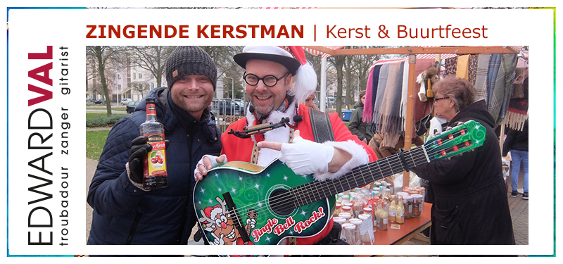 Buurtfeest | zingende kerstman boeken kerstact edward val troubadour zanger gitarist mobiele muzikant braderie